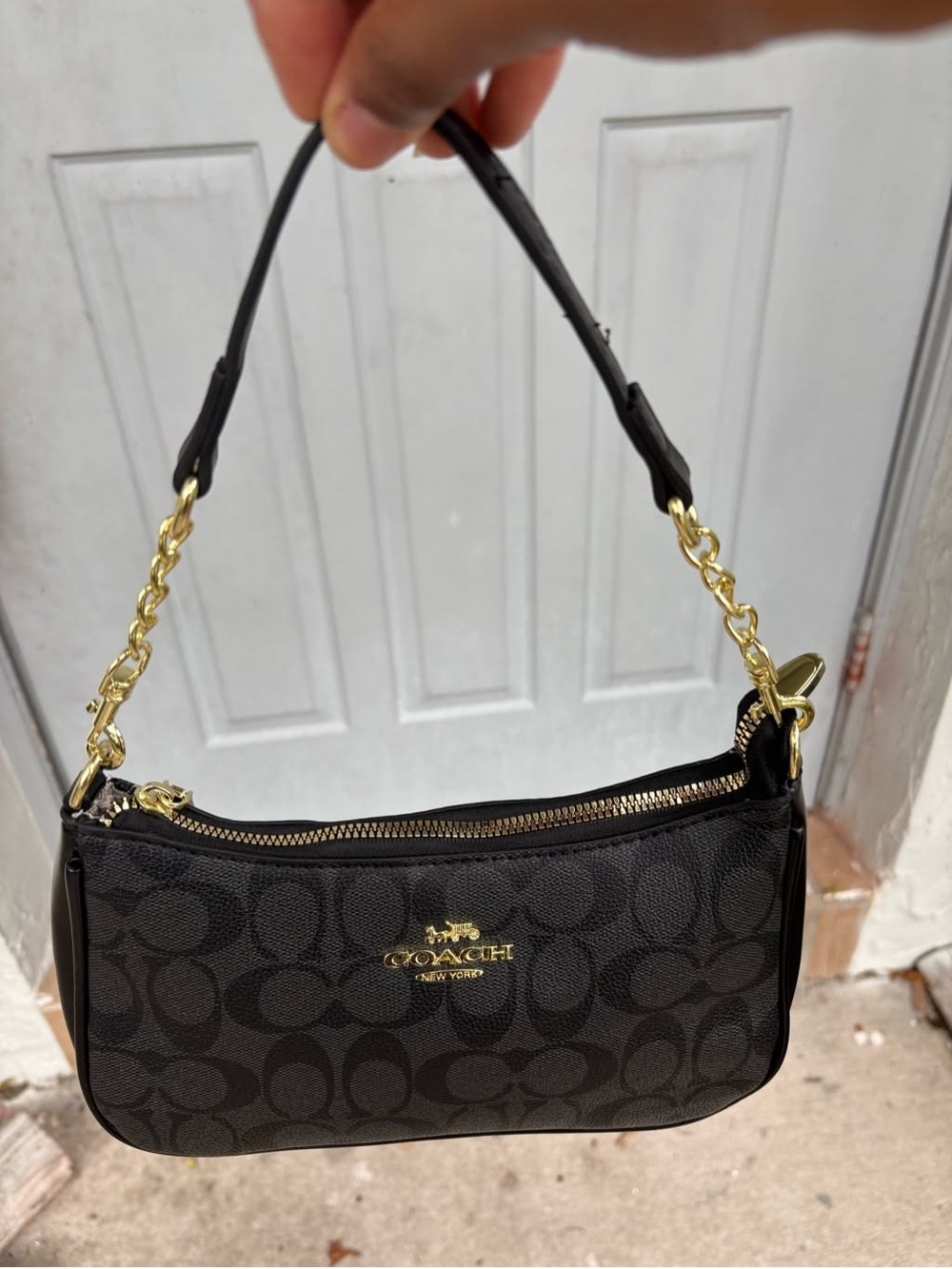Coach Black Signature Canvas Shoulder Bag with Gold Hardware Accents